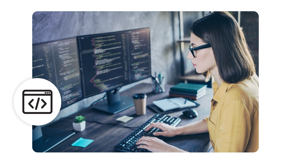 A woman works at her desk. 